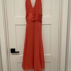 Maggy London halter, fit and flare, orange/pink dress with pleated back bow tie